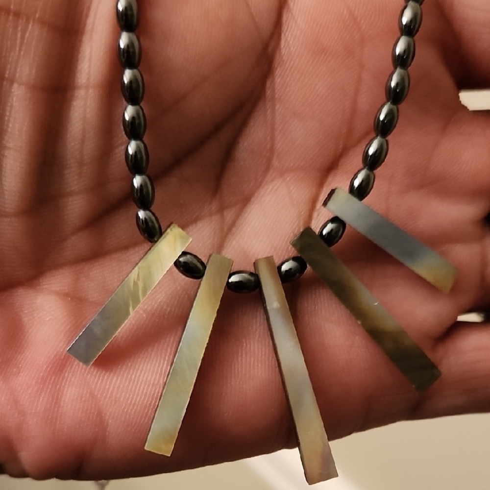 Geometric Black and Gold Necklace with Minimalist Design